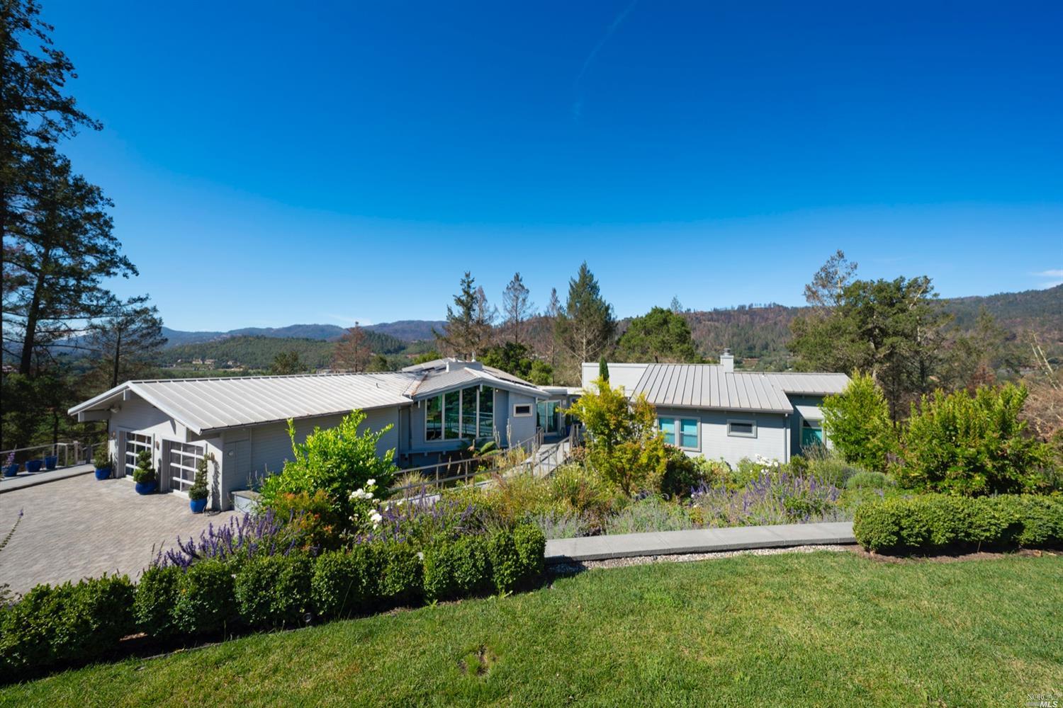 9 Bournemouth Road St. Helena, CA 94574 - Photo 31 of 40 a front view of a house with a yard