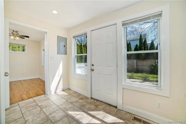 a view of a room with a front door