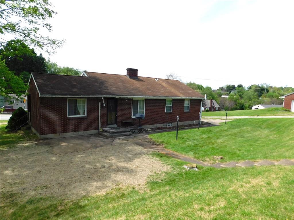 104 Memory Lane Apollo, PA 15613 - Photo 3 of 18 a view of a house with a backyard