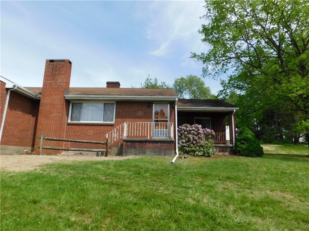 104 Memory Lane Apollo, PA 15613 - Photo 7 of 18 a front view of a house with garden