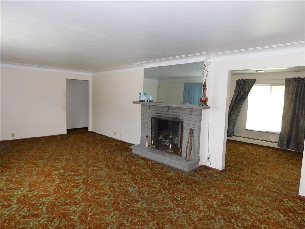 104 Memory Lane Apollo, PA 15613 - Photo 10 of 18 an empty room with a fireplace