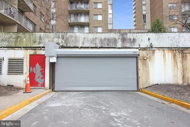 a view of a street with a building
