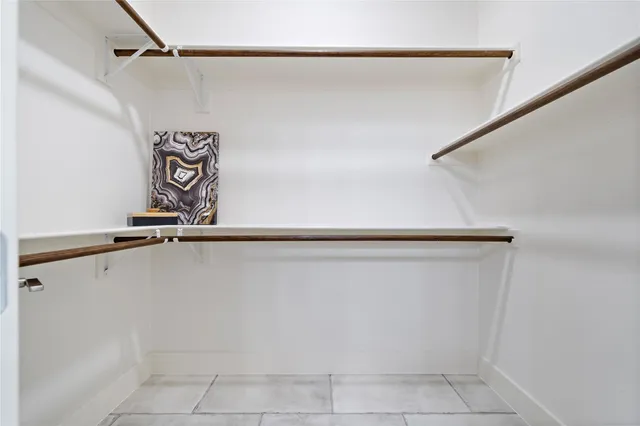 a view of utility room with closet