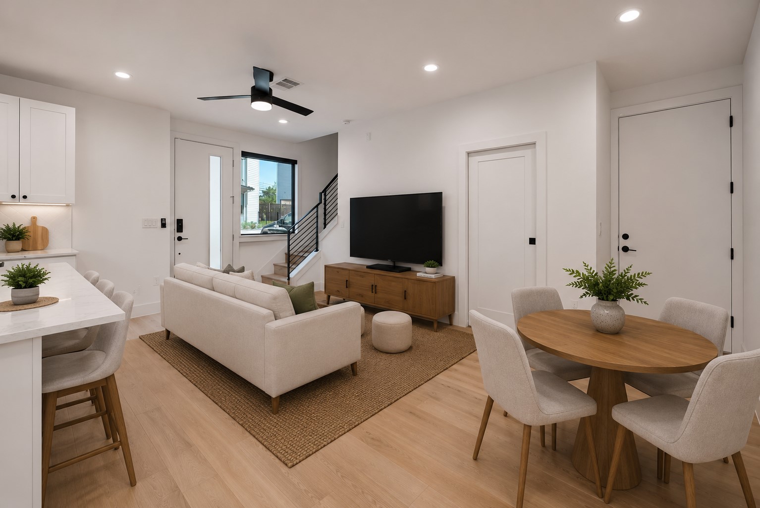 1140 Webberville Road, Unit 9 Austin, TX 78721 - Photo 5 of 13 Virtual: Clean lines and a modern aesthetic define this inviting open-concept living space.