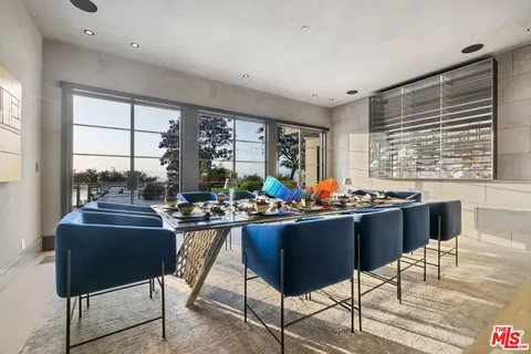 a view of a workspace with furniture