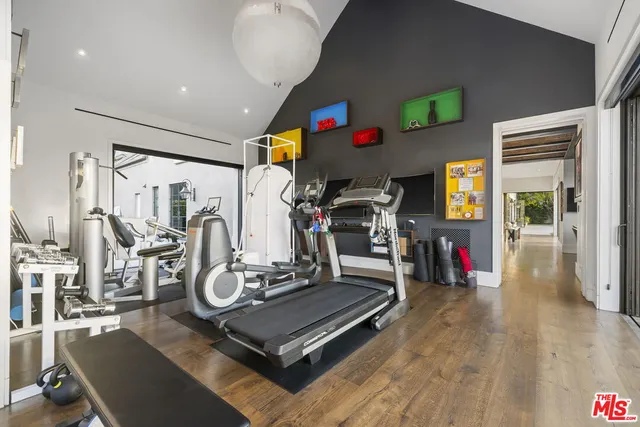 a view of a chairs and table in backyard