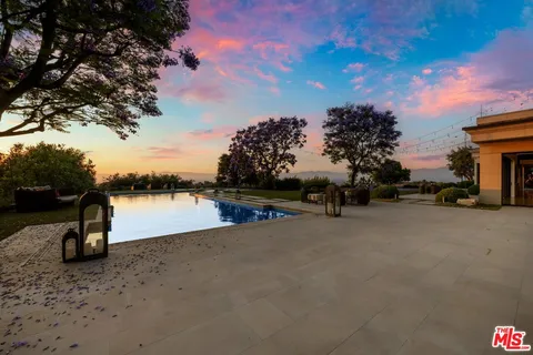 a view of sunset and mountains