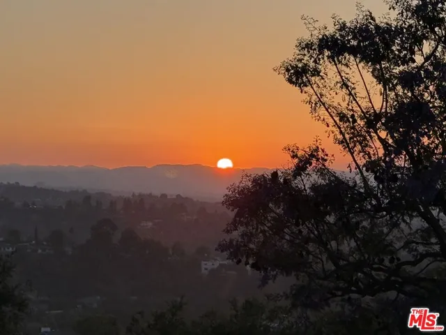 a view of swimming pool with outdoor seating