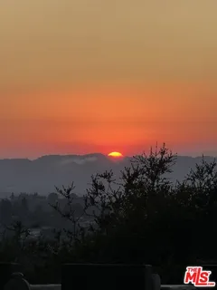 a swimming pool view with a outdoor space
