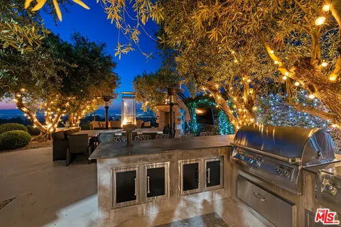 a view of a lake in middle of forest