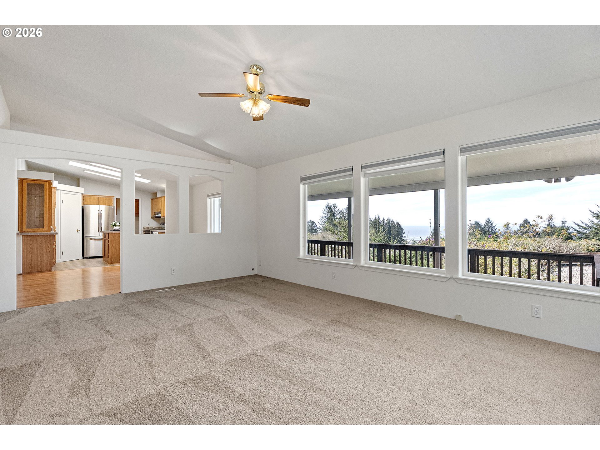 98041 Hallway Road, Unit 41 Brookings, OR 97415 - Photo 25 of 48 a view of an empty room with a window