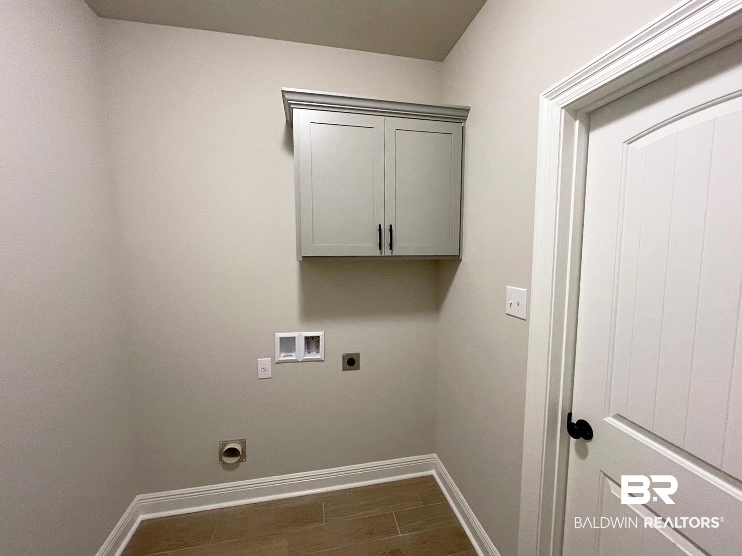 1355 Fenton Circle Foley, AL 36535 - Photo 14 of 17 Clothes washing area featuring washer hookup, electric dryer hookup, and dark hardwood / wood-style floors