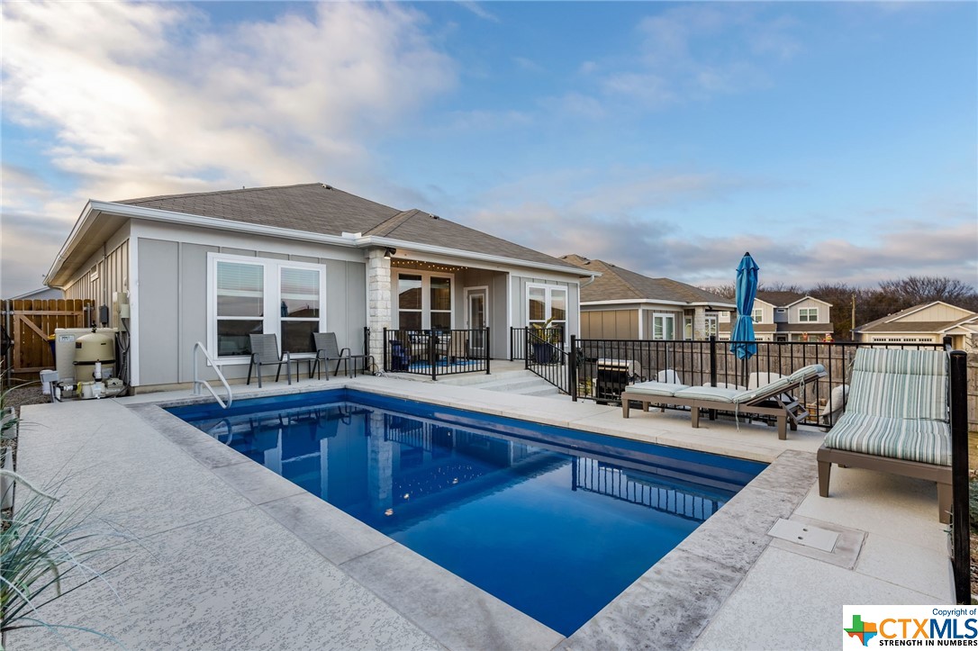 437 Poplin Lane Troy, TX 76579 - Photo 1 of 1 a view of a kitchen with swimming pool and sitting area