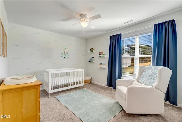 a view of a swimming pool with a lounge chairs