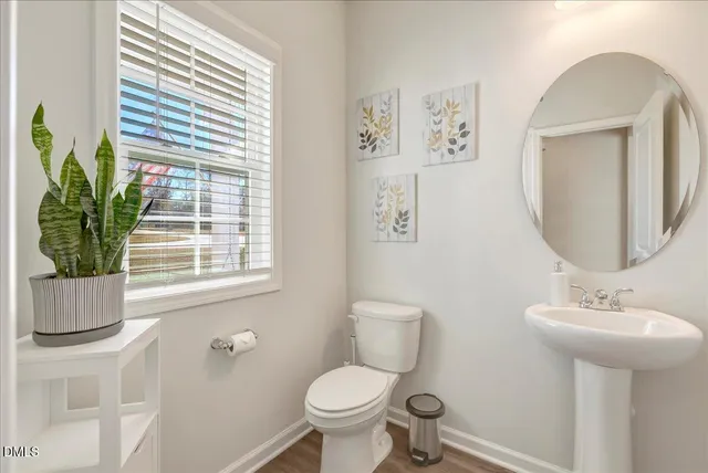 a kitchen with stainless steel appliances granite countertop a refrigerator stove microwave and sink