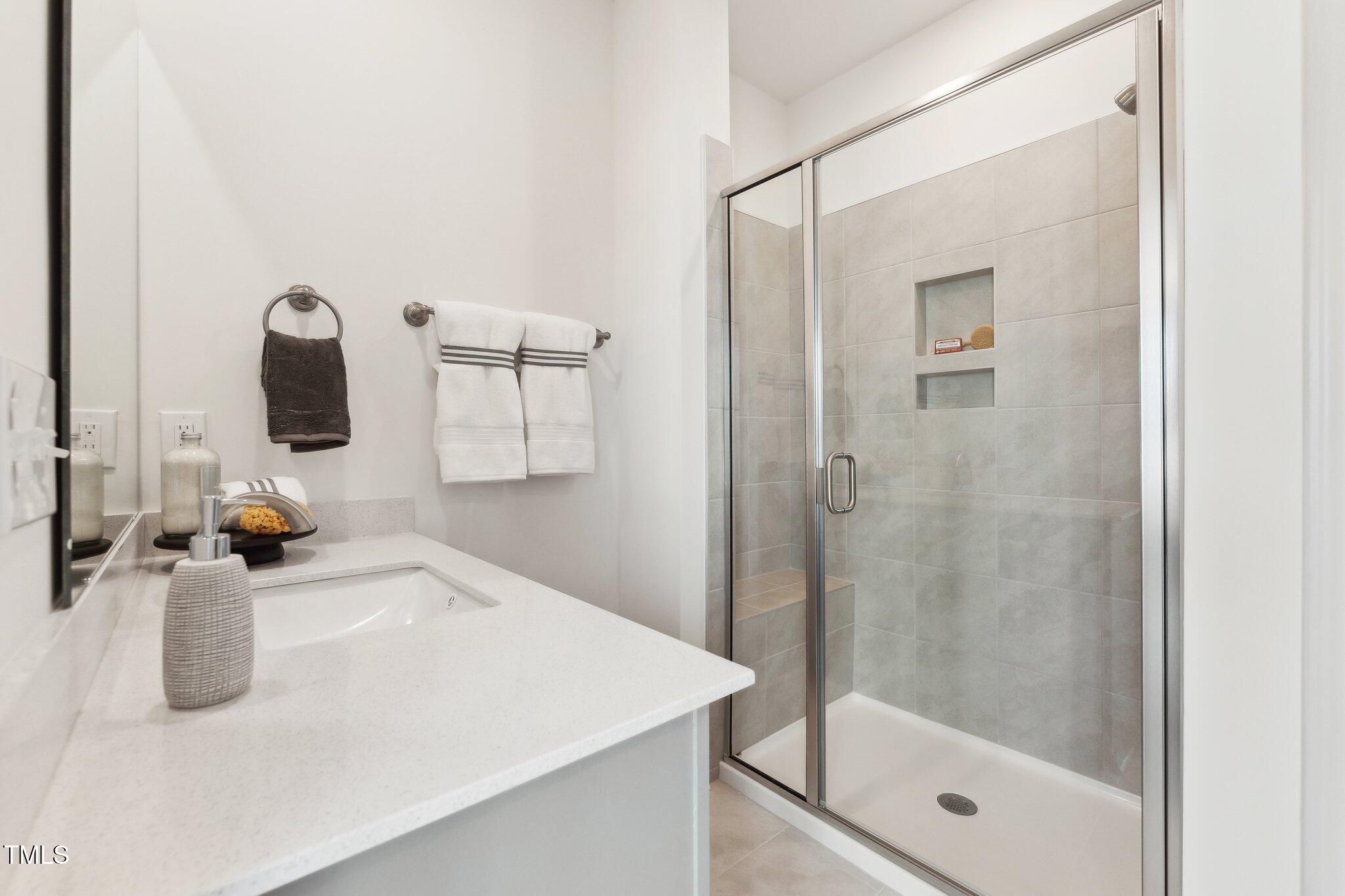 600 Hedrick Ridge Road, Unit 306 Cary, NC 27519 - Photo 15 of 33 Primary Bath 1