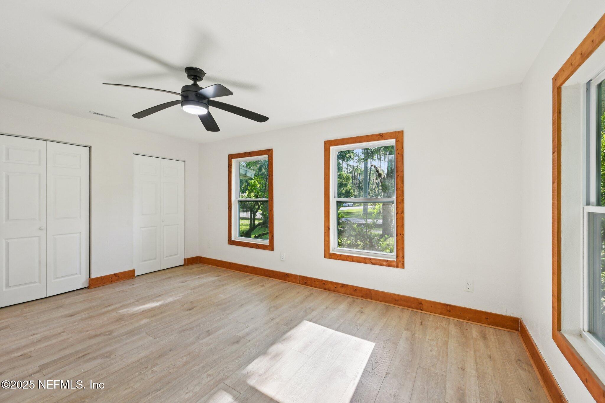 1217 Colley Road Starke, FL 32091 - Photo 18 of 42 a view of empty room with wooden floor and fan