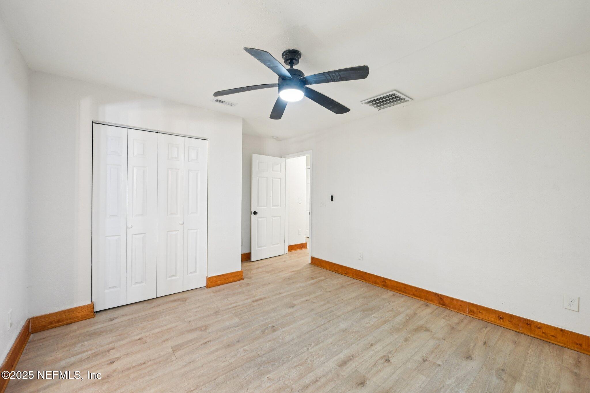 1217 Colley Road Starke, FL 32091 - Photo 23 of 42 a view of empty room with wooden floor