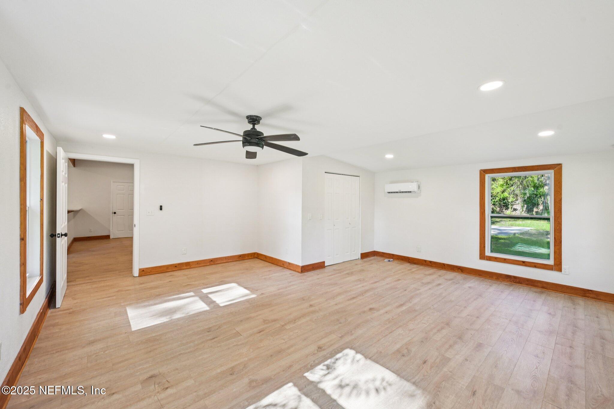 1217 Colley Road Starke, FL 32091 - Photo 28 of 42 a view of empty room with wooden floor and fan
