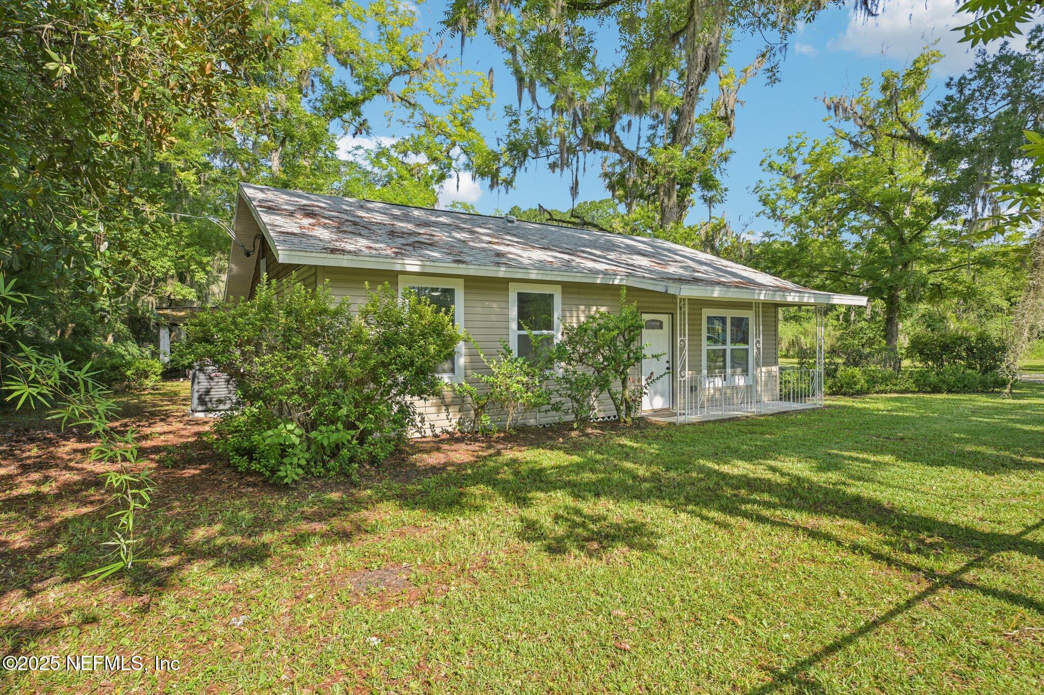 1217 Colley Road Starke, FL 32091 - Photo 3 of 42 a view of a house with a yard