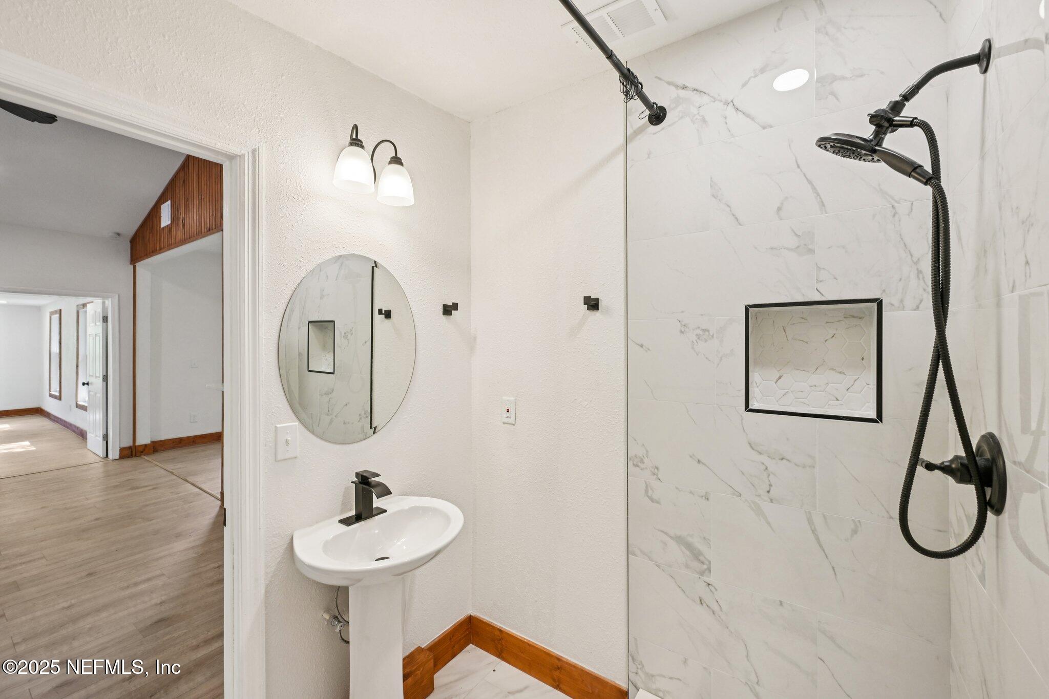 1217 Colley Road Starke, FL 32091 - Photo 31 of 42 a bathroom with a shower