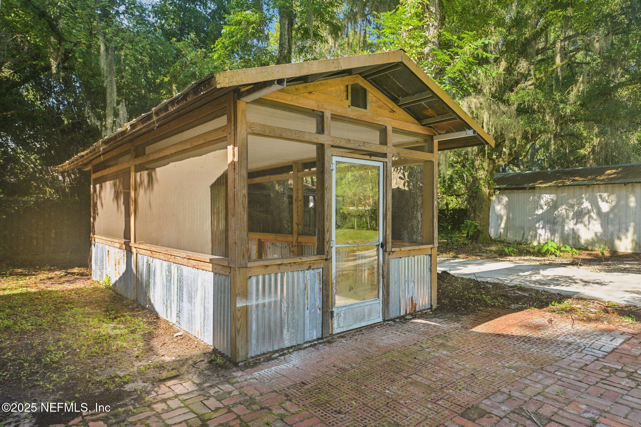 1217 Colley Road Starke, FL 32091 - Photo 32 of 42 a view of a small house with yard