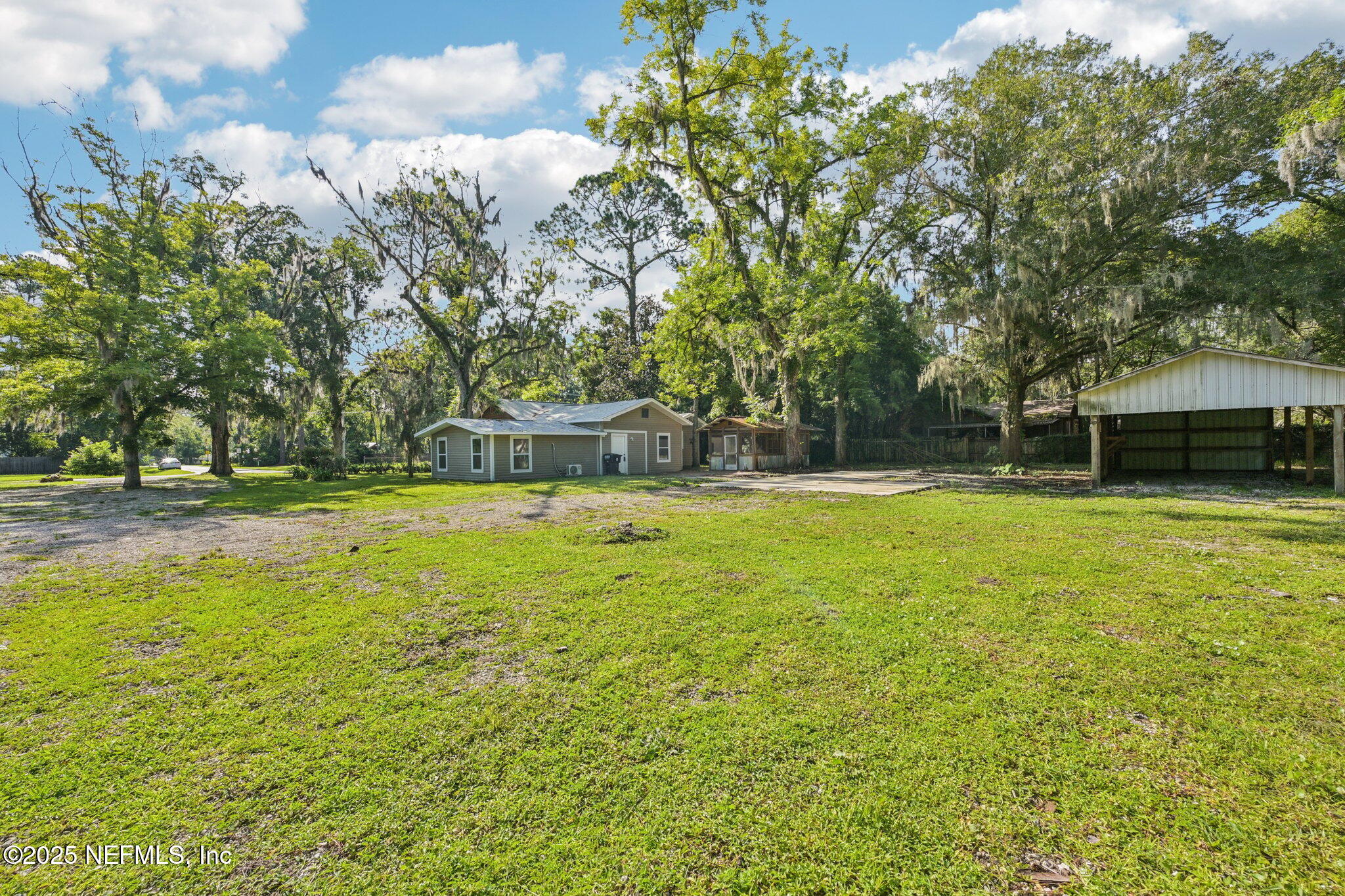 1217 Colley Road Starke, FL 32091 - Photo 36 of 42 a view of a swimming pool with a yard