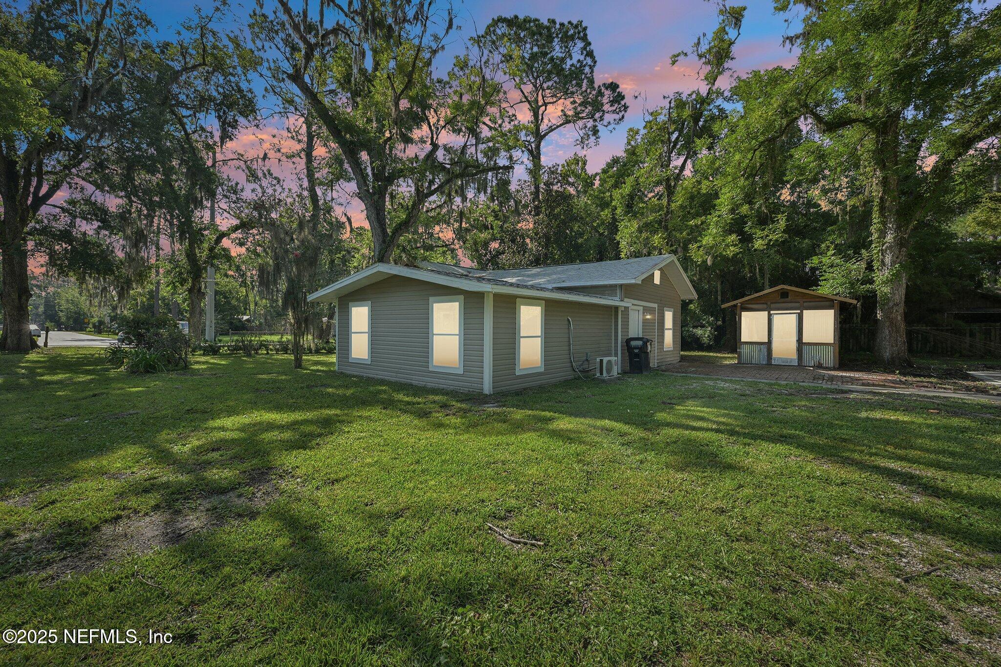 1217 Colley Road Starke, FL 32091 - Photo 40 of 42 a backyard of a house with lots of green space