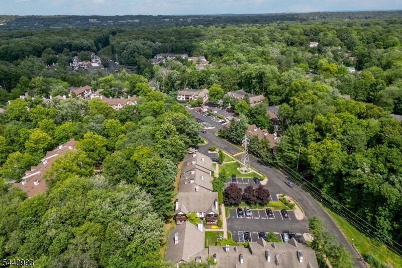 609 Mark Twain Way Mahwah, NJ 07430 - Photo 34 of 40 an aerial view of residential house with outdoor space and trees all around