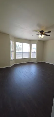 a kitchen with stainless steel appliances a stove and cabinets