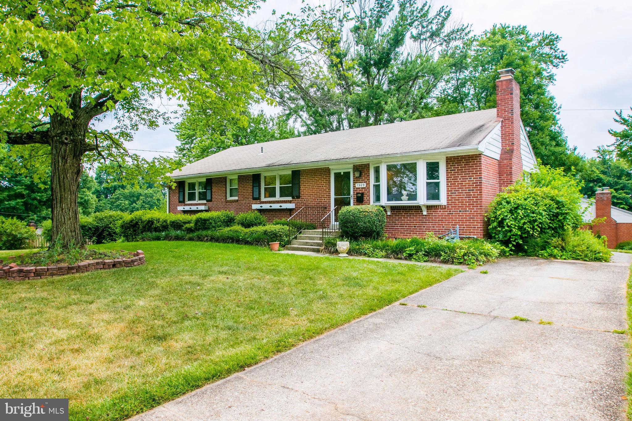 7909 Ellet Road Springfield, VA 22151 - Photo 2 of 30 a view of a house with a garden