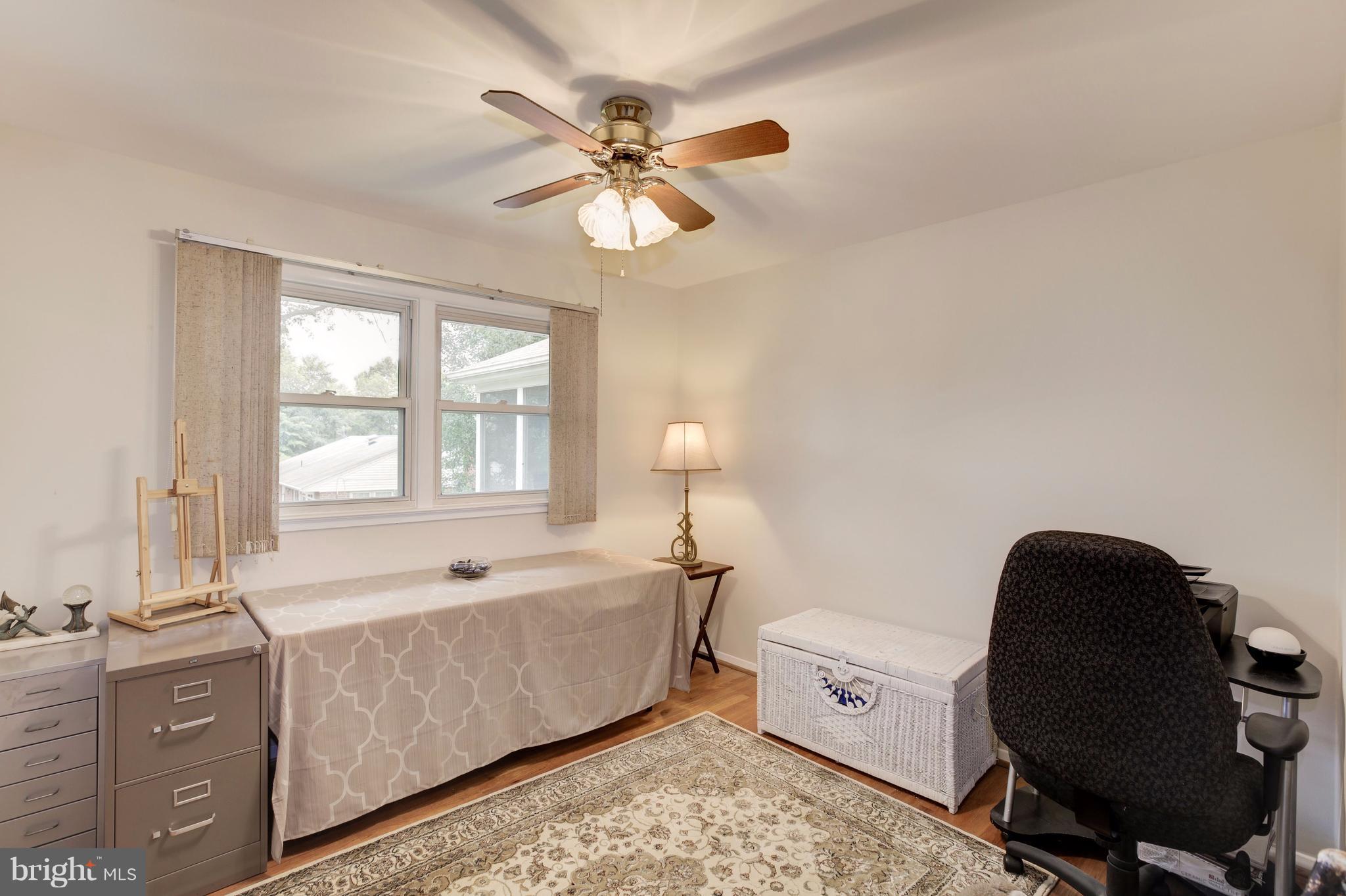 7909 Ellet Road Springfield, VA 22151 - Photo 19 of 30 a living room with furniture and a window
