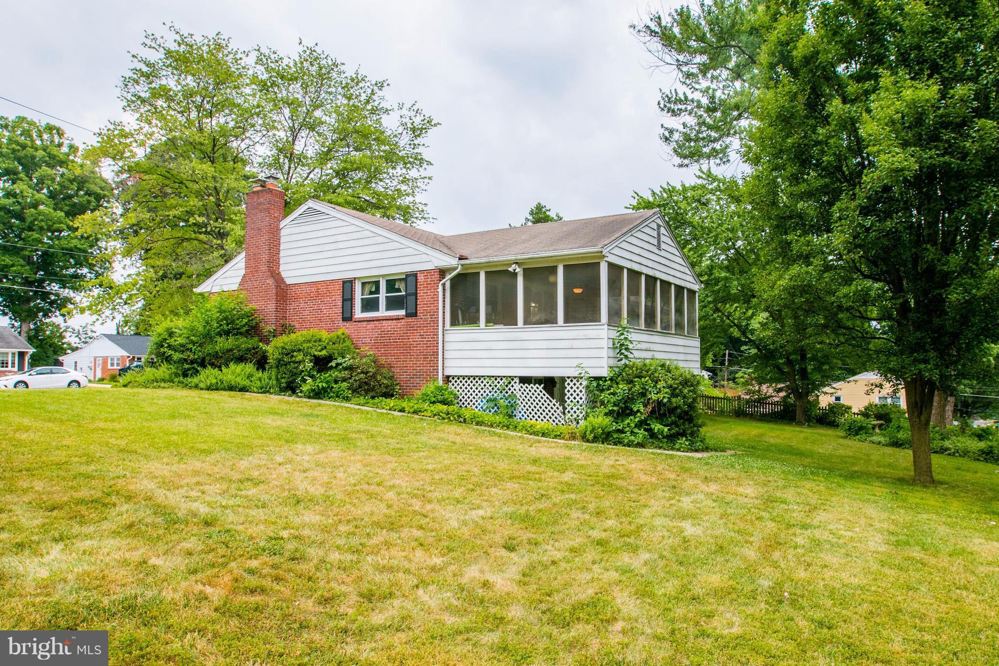 7909 Ellet Road Springfield, VA 22151 - Photo 29 of 30 a front view of a house with garden