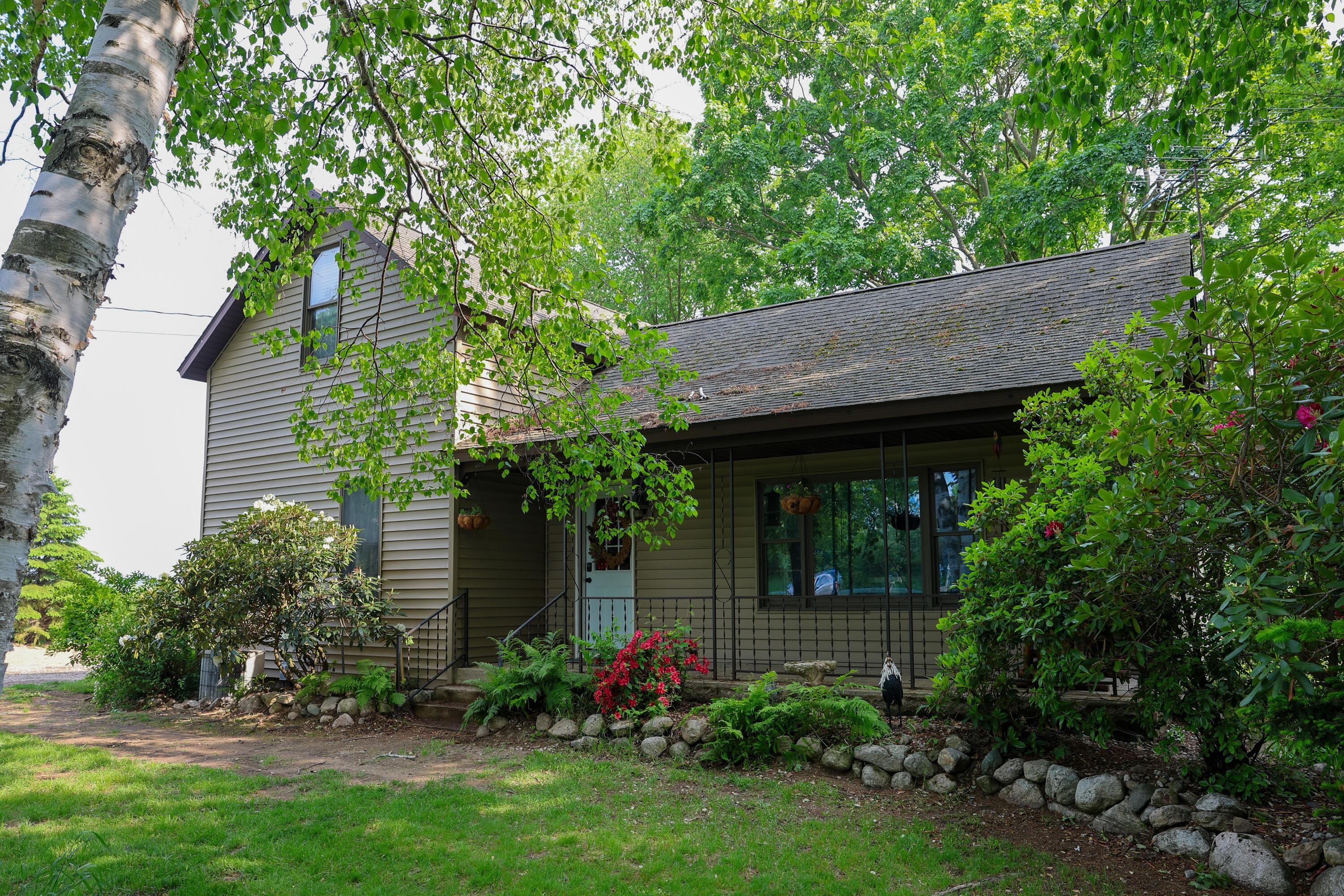 1041 West Arthur Road Rothbury, MI 49452 - Photo 1 of 56 House Front 2