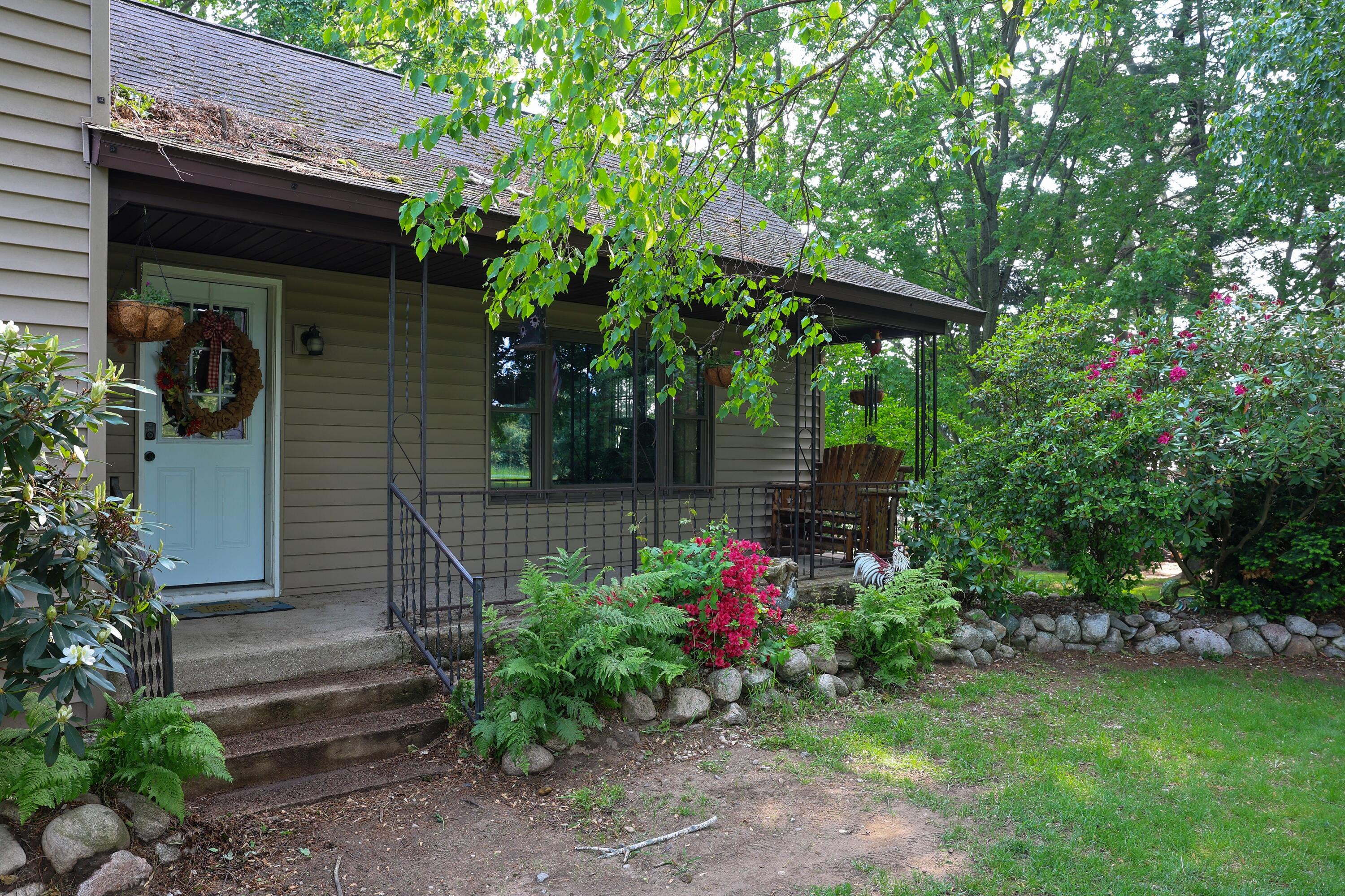 1041 West Arthur Road Rothbury, MI 49452 - Photo 3 of 56 House Front (1)