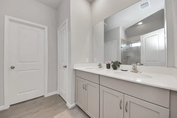 a bathroom with a shower and a shower