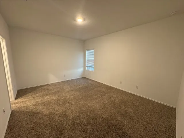 an empty room with a natural light