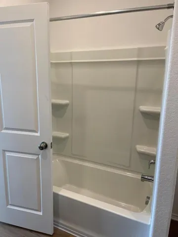 a bathroom with a bathtub