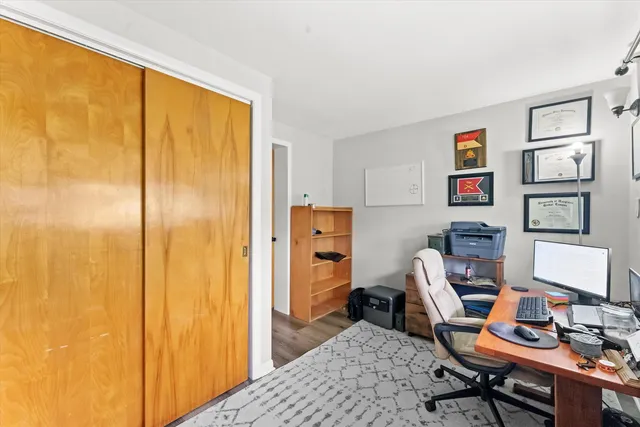 a workspace with furniture and window