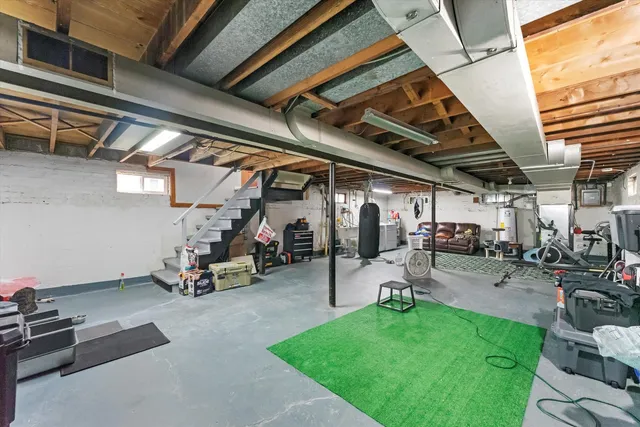 a view of a garage with parked cars