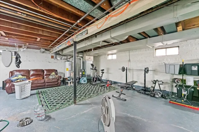 a view of a chairs and table in a patio