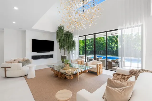 a bathroom with a double vanity sink toilet and shower