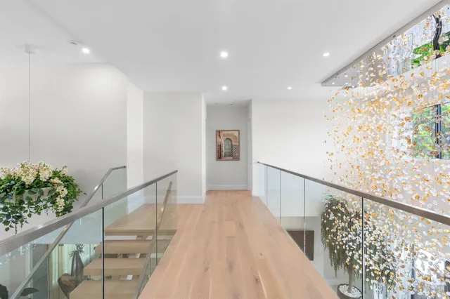 a view of a house with backyard porch and sitting area