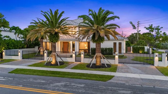 a view of a house with swimming pool