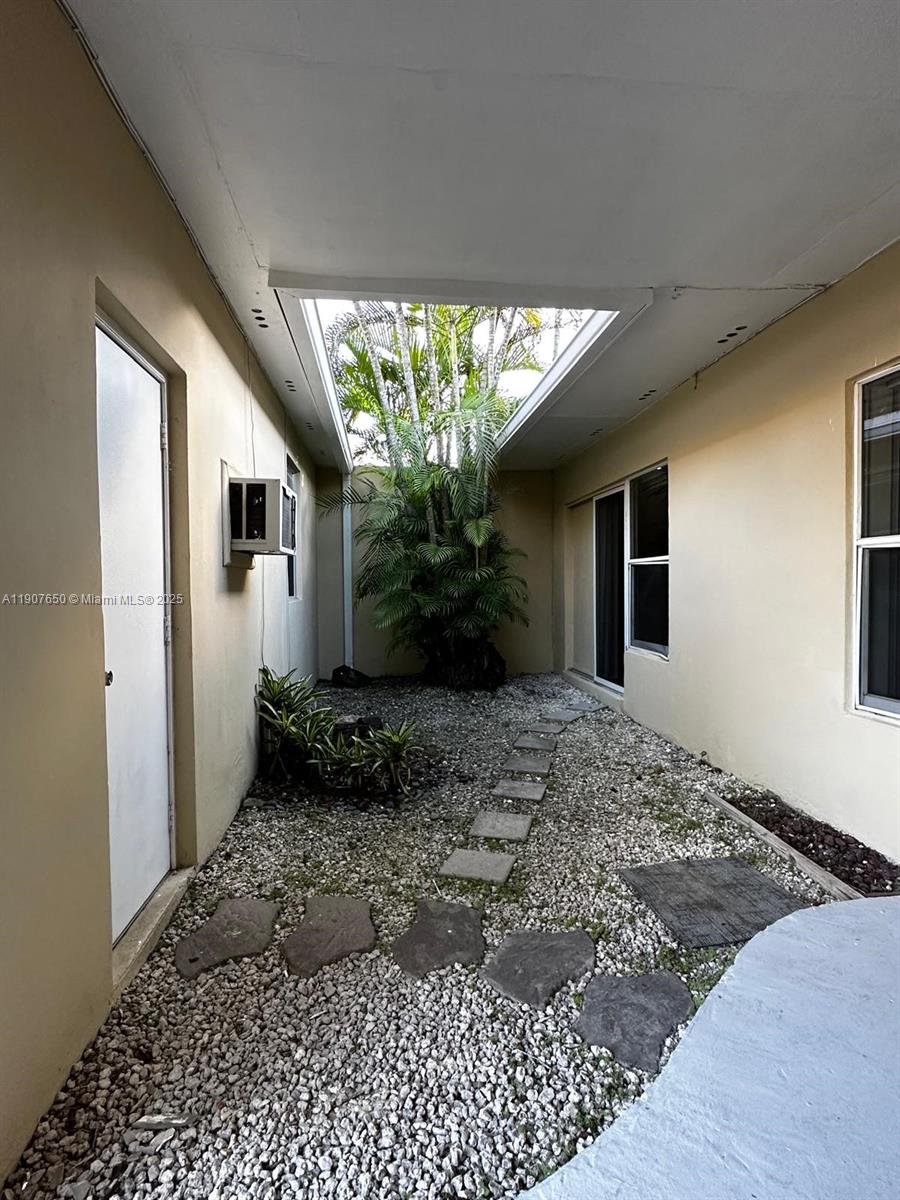8420 Southwest 102nd Avenue, Unit 8420 Miami, FL 33173 - Photo 2 of 12 a view of a house with a yard