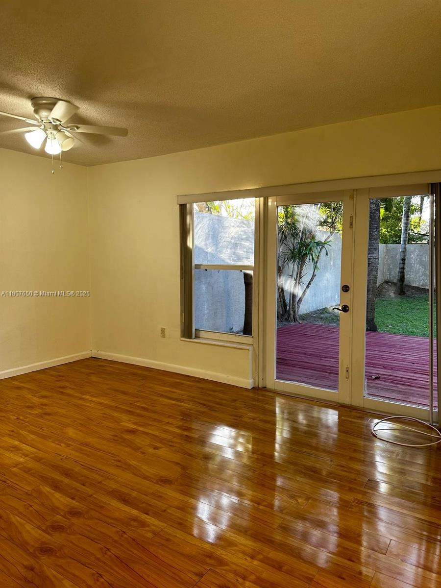 8420 Southwest 102nd Avenue, Unit 8420 Miami, FL 33173 - Photo 5 of 12 a view of empty room with window