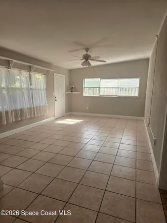 a view of a livingroom with a staircase