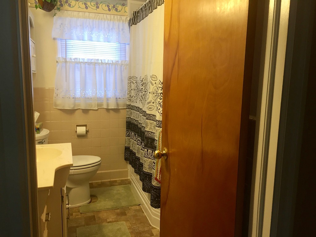 226 Winton Street Springfield, MA 01118 - Photo 21 of 27 a bathroom with a sink and a toilet