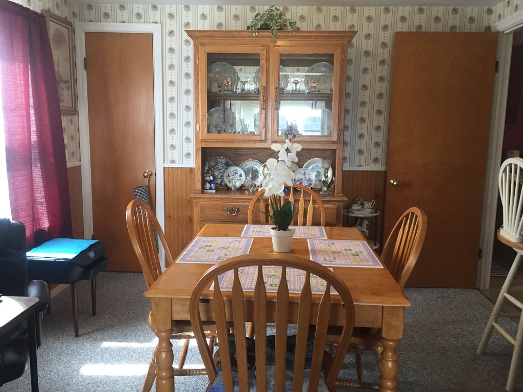 226 Winton Street Springfield, MA 01118 - Photo 10 of 27 a view of a dining room with furniture window and outside view