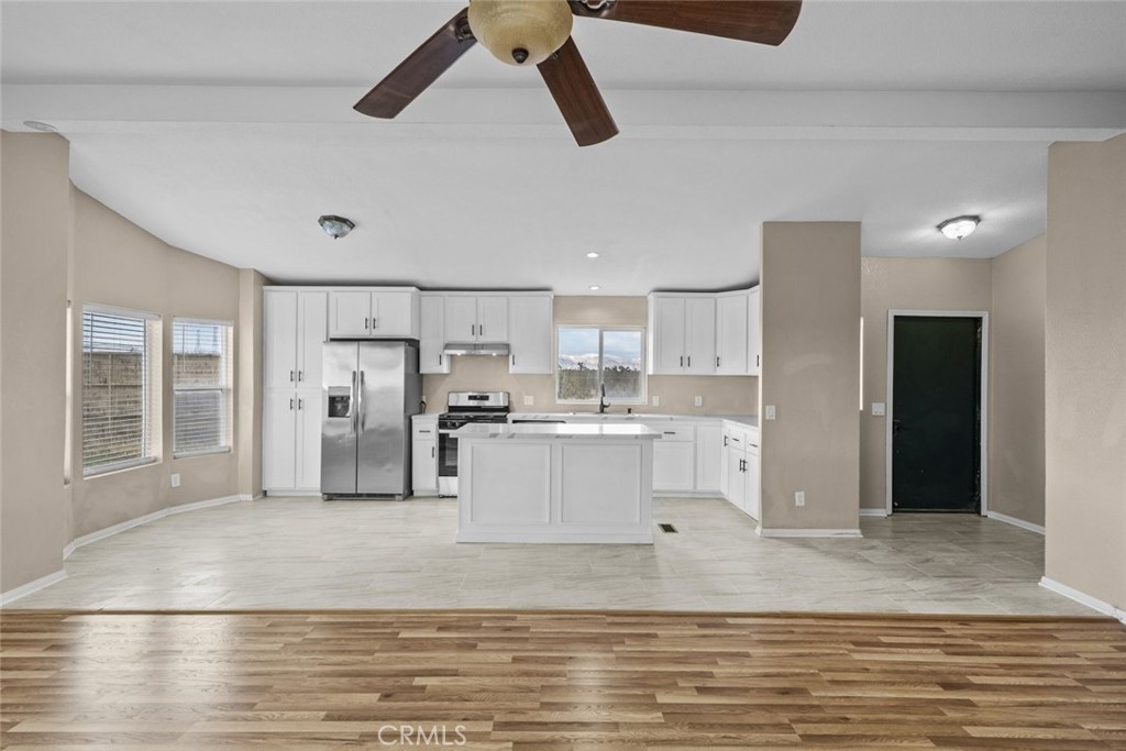 6142 Rare Rabbit Avenue Mojave, CA 93501 - Photo 16 of 50 a view of kitchen with stainless steel appliances refrigerator oven and cabinets